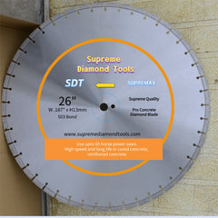 A circular saw blade with orange and white labeling that reads 'SUPREME DIAMOND TOOLS', '26"', and 'SUPREME QUALITY'. The label also includes the text 'PRO CONCRETE BLADE' and the website 'www.supremediamond.com